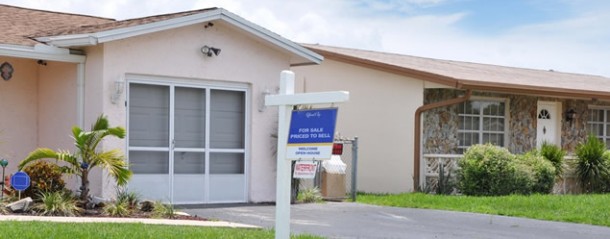 House and for Sale Sign